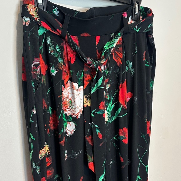Express Black Pants with Red and Green Floral Design - Picture 3 of 3